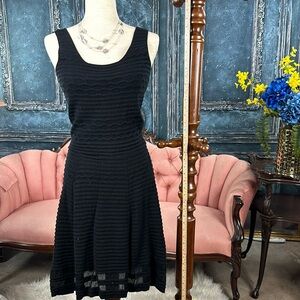 Flirty skater type dress in light sweater stretchy material -BLACK-